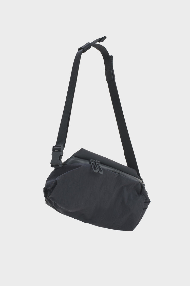 NEDA KOMATSU ONIBEGIE NYLON black bag