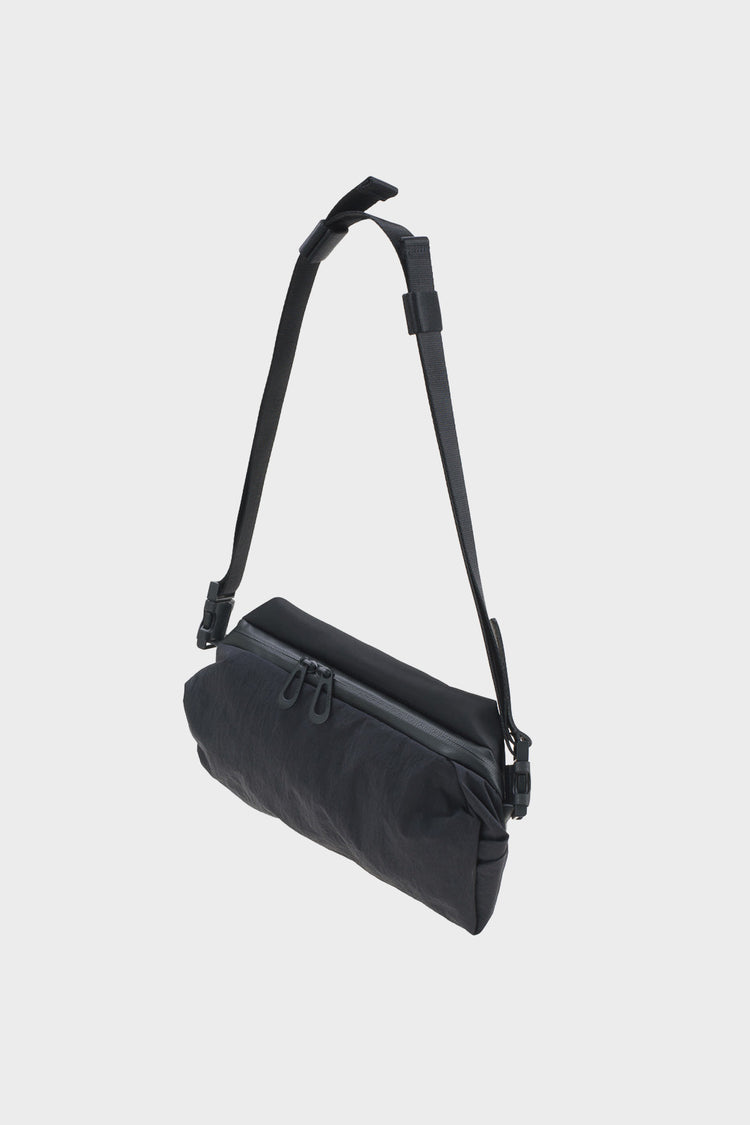 NEDA KOMATSU ONIBEGIE NYLON black bag
