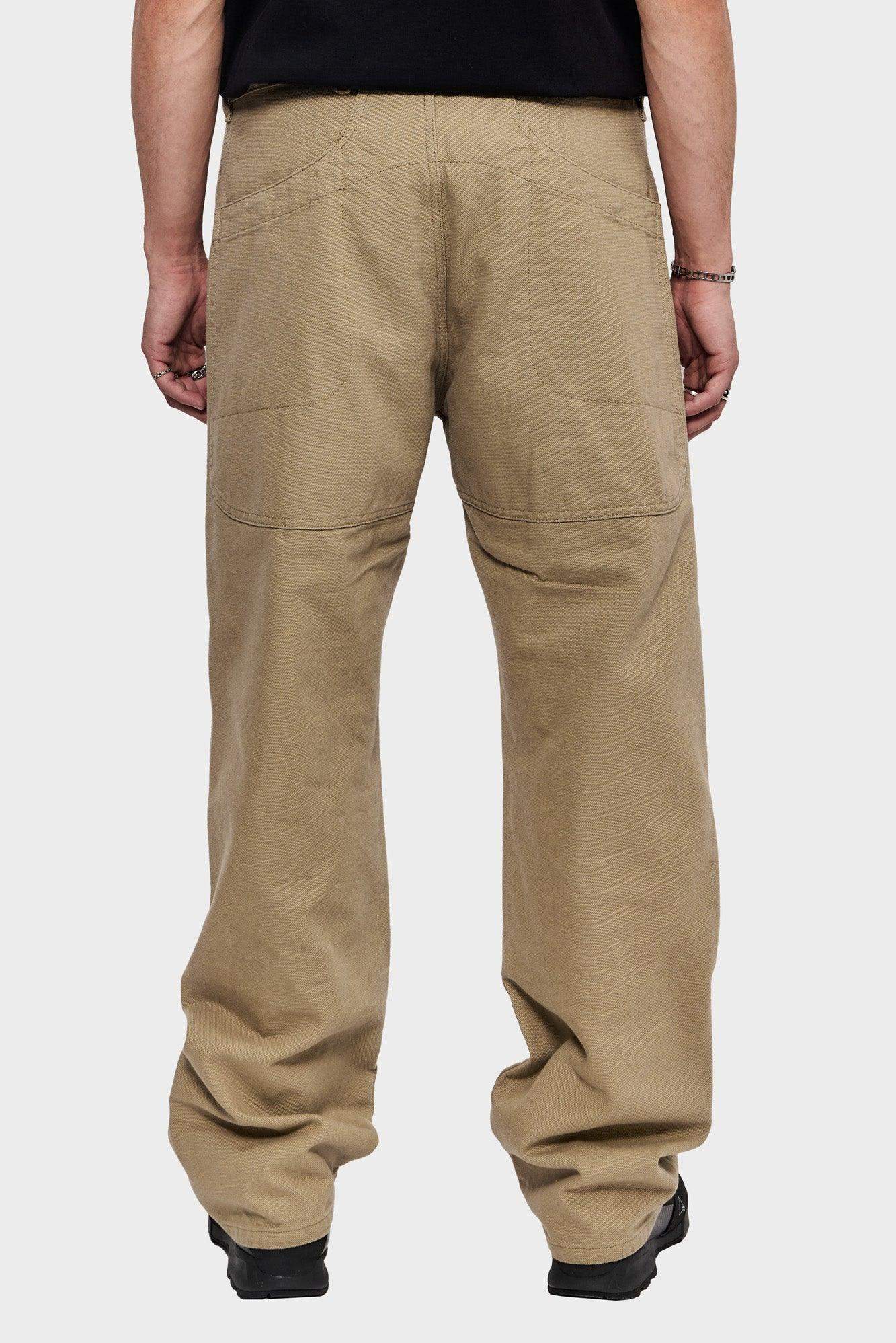 Beżowe spodnie męskie loose fit, szerokie nogawki, tylne kieszenie, styl streetwear