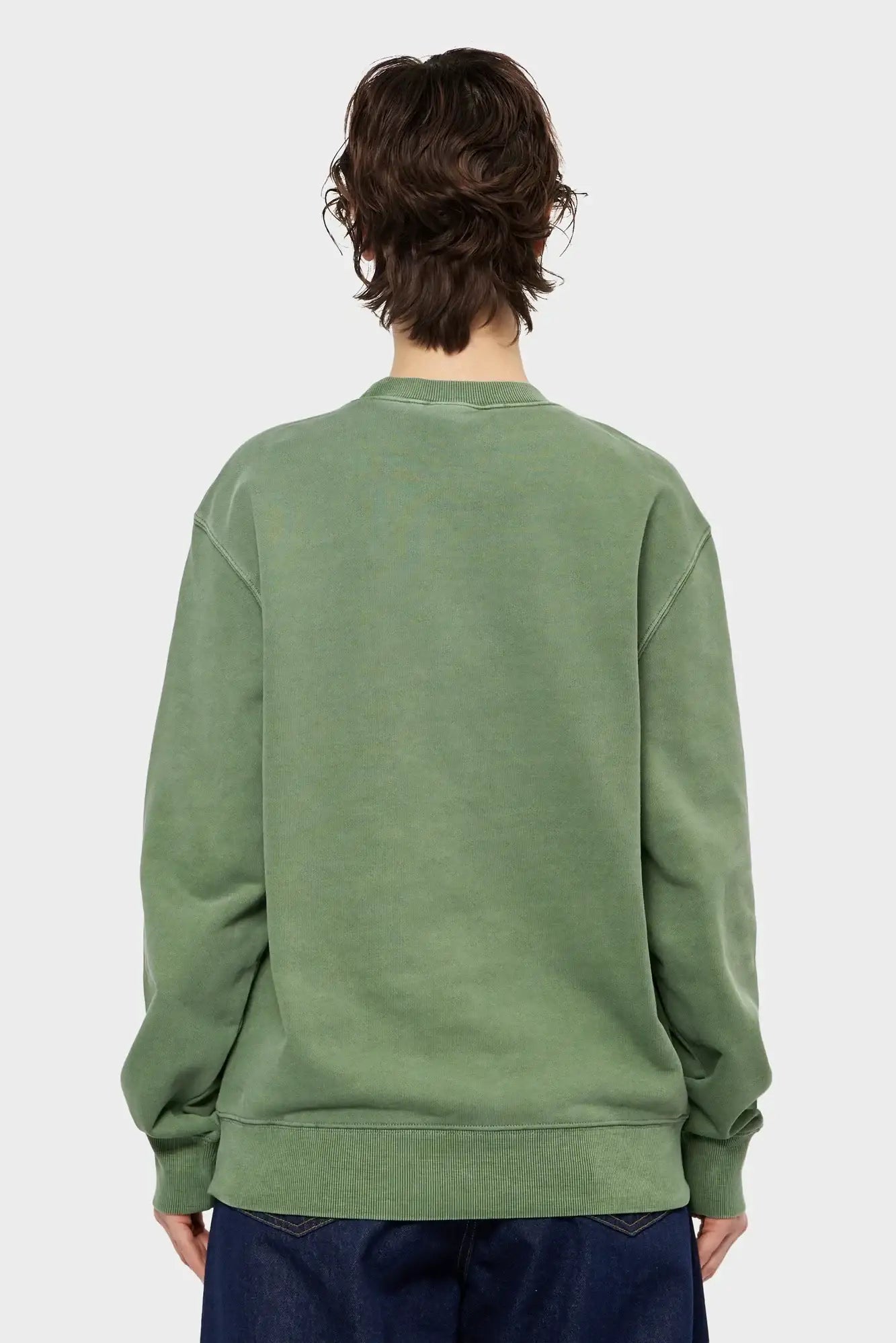 Zielona bluza oversize bez nadruku, widok od tyłu, moda streetwearowa