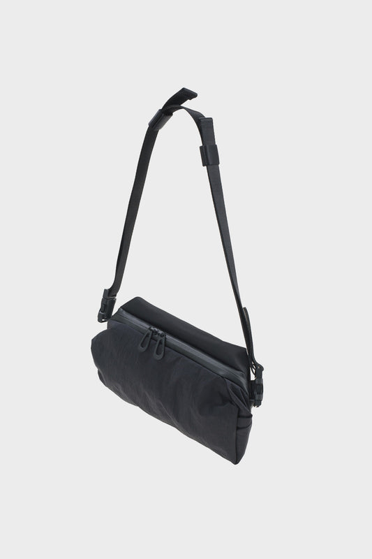 NEDA KOMATSU ONIBEGIE NYLON black bag